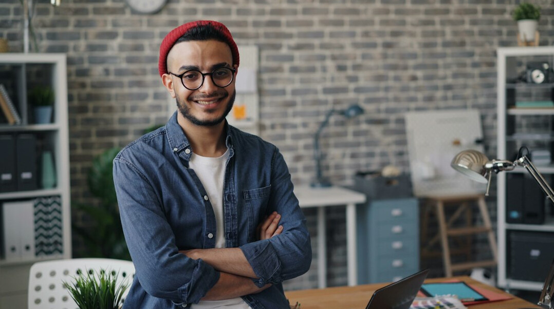 successful programmer smiling