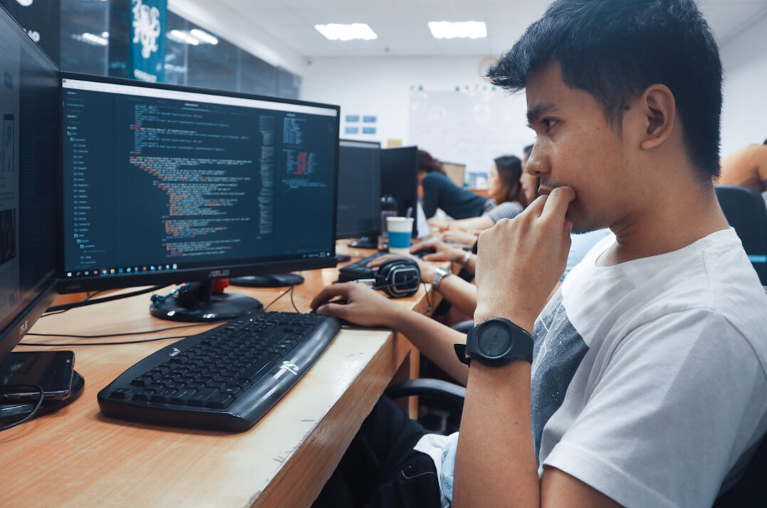diverse students learning programming