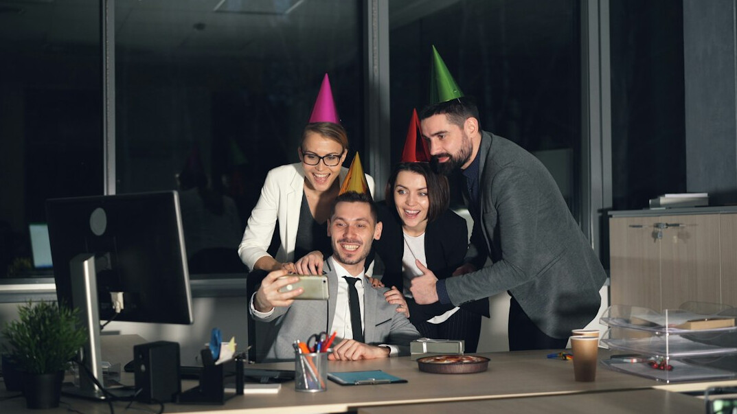 group of programmers celebrating