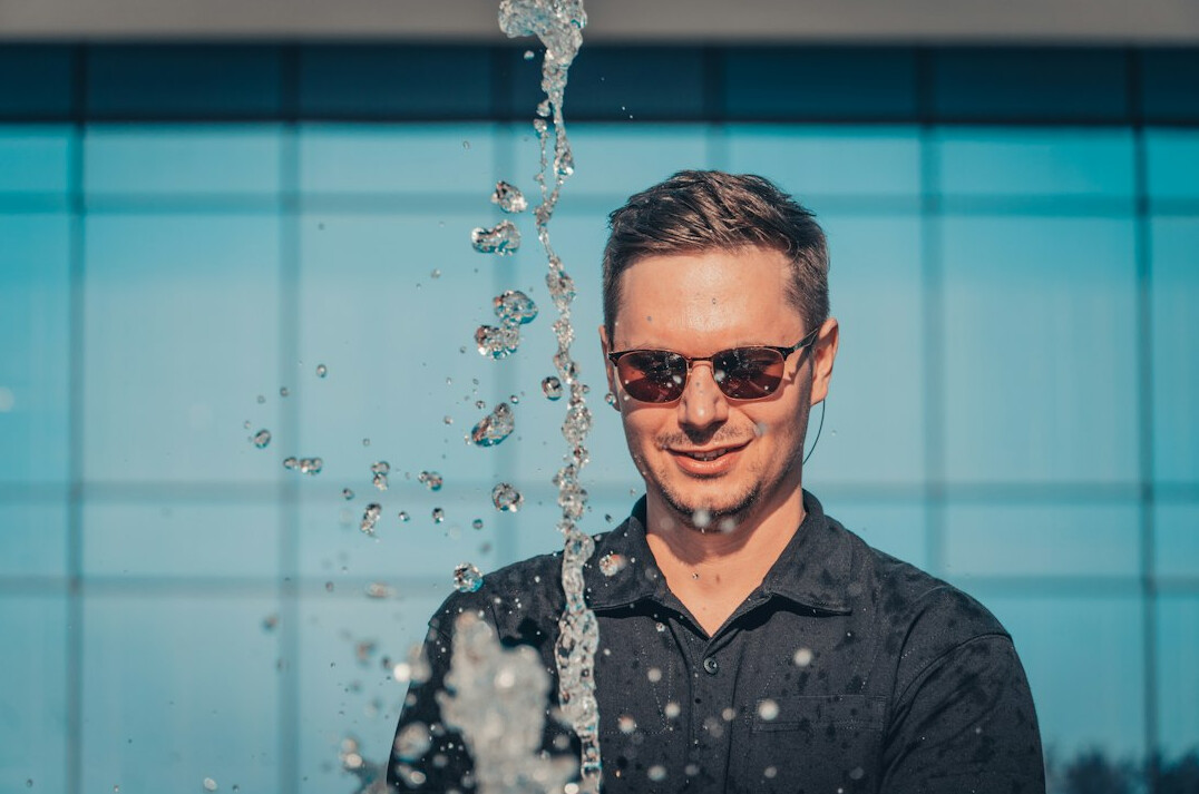 Studio portrait of a Chinese Malaysian man wearing glasses